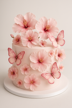 Load image into Gallery viewer, Beautiful cake with 3D edible pink hibiscus flowers and butterfly toppers