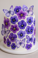 Load image into Gallery viewer, beautiful cake design using purple flowers and butterflies as edible sheet stickers
